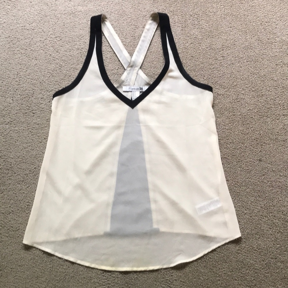 Cream and black tank